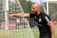 Peter Luccin, new FC Dallas interim head coach, directs his players during his first...
