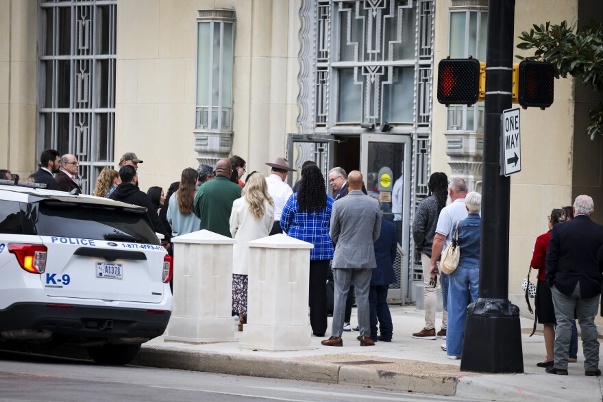 People line up to enter the Eldon B. Mahon U.S. Courthouse for the Prairieland ICE shooting trial Tuesday, Feb. 17, 2026, in Fort Worth.