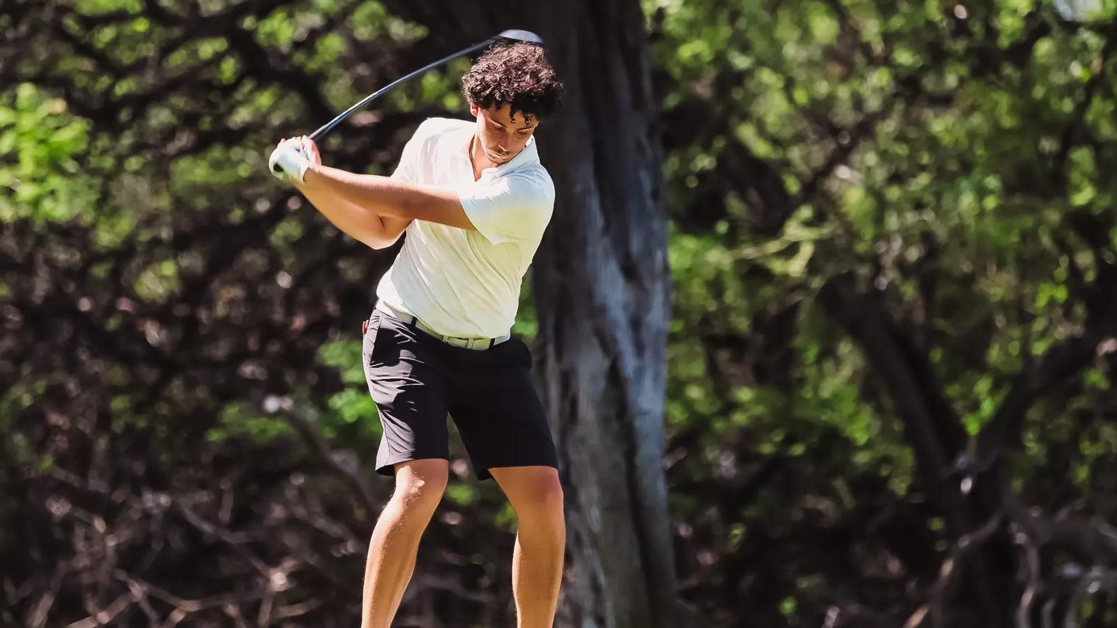Price Hill waits to putt during practice round at the Rawls Course