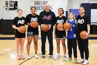 Dallas Mavericks head coach Jason Kidd takes photos with the athletes during the launching...