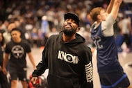 Kyrie Irving greets fans during The Dallas Mavericks Fan Jam at American Airline Center in...