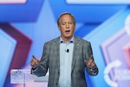 Texas Attorney General Ken Paxton speaks during Turning Point USA's AmericaFest 2025,...