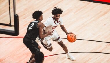 JT Toppin looks toward his team during a game.