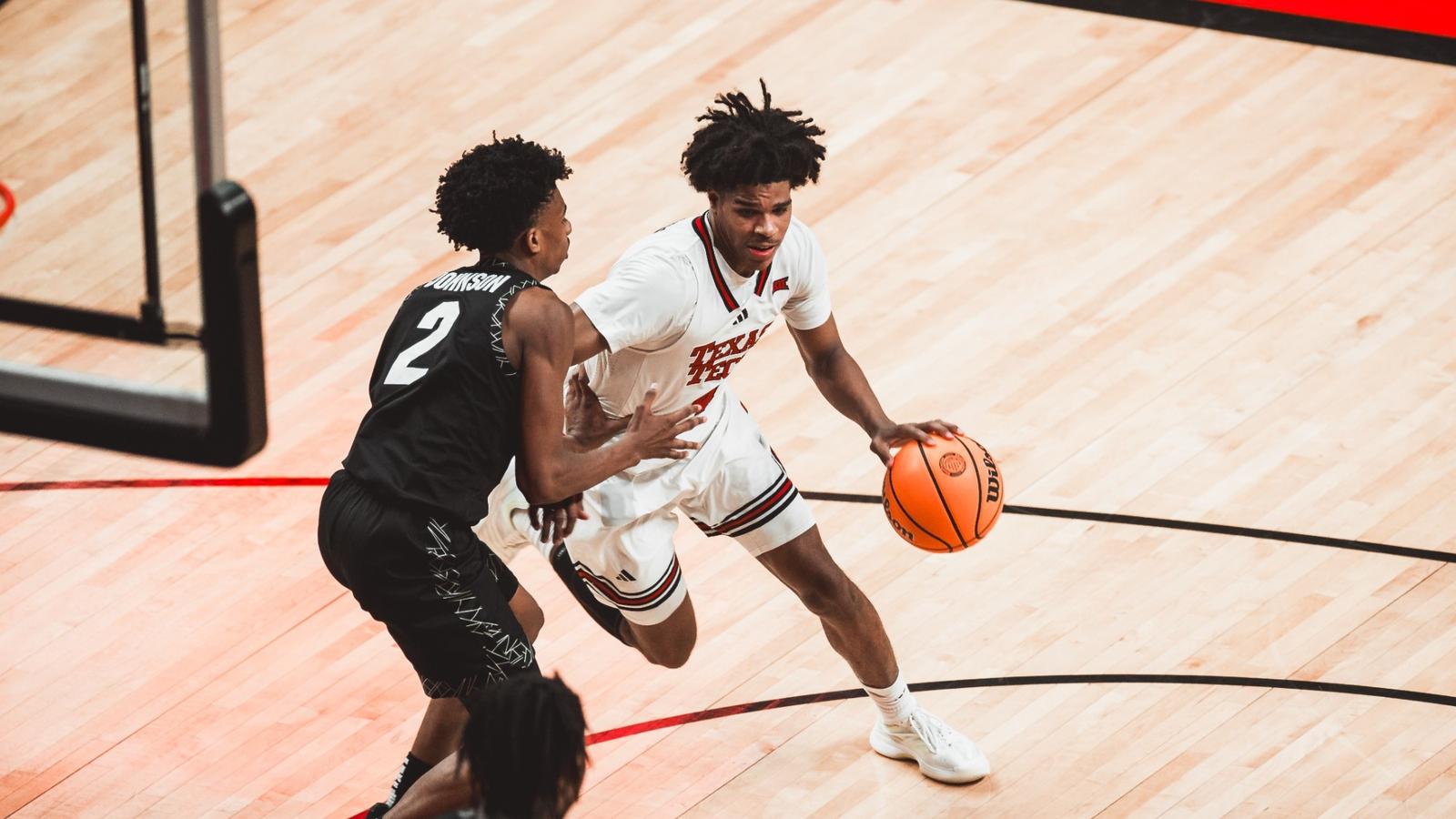 JT Toppin looks toward his team during a game.