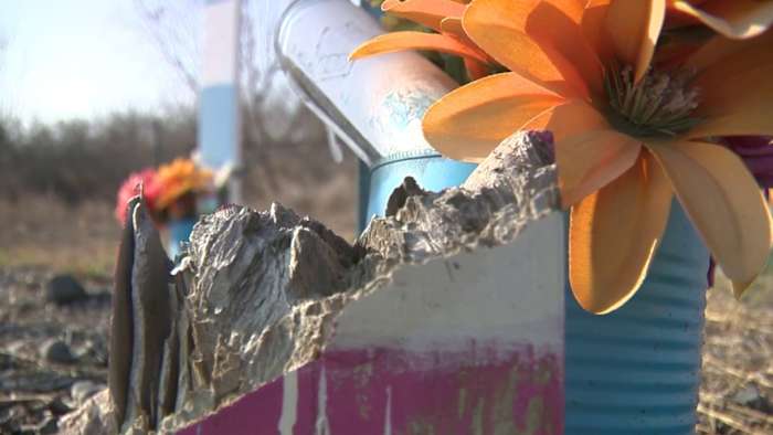 Community calls for action as problems persist at memorial for 53 migrants on Quintana Road