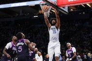 Dallas Mavericks' Marvin Bagley III (35) dunks against the Minnesota Timberwolves during the...