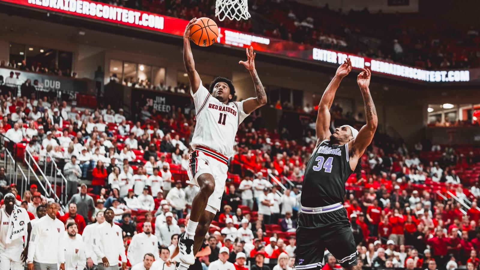 Donovan Atwell shoots a 3-pointer in Tech's win over K-State.