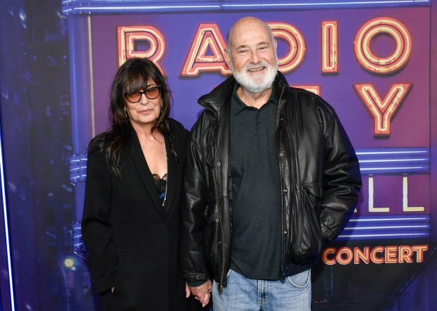 FILE - Rob Reiner, right, and wife Michele Singer Reiner attend the SNL50: The Homecoming Concert at Radio City Music Hall on Friday, Feb. 14, 2025, in New York. (Photo by Evan Agostini/Invision/AP, File)