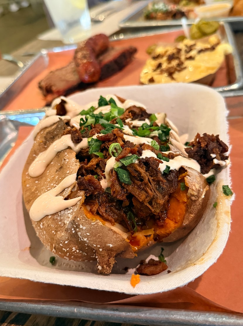 The Hot Mess is a loaded sweet potato from Pecan Lodge in Dallas. Pats of butter are shoved...