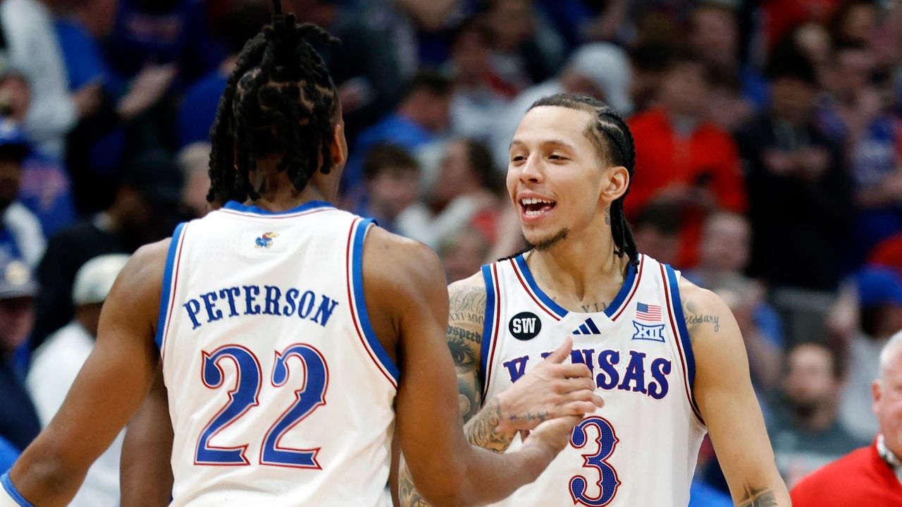 White scores 23 as No. 14 Kansas rebounds with 69-56 win over No. 5 Houston