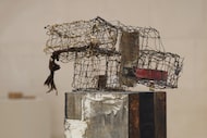 Installation view of Robert Rauschenberg, "Three Traps for Medea," 1959. Combine: oil,...