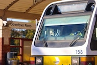 A red line DART train arrives at Downtown Plano station, on Wednesday, Nov. 5, 2025 in Plano. 