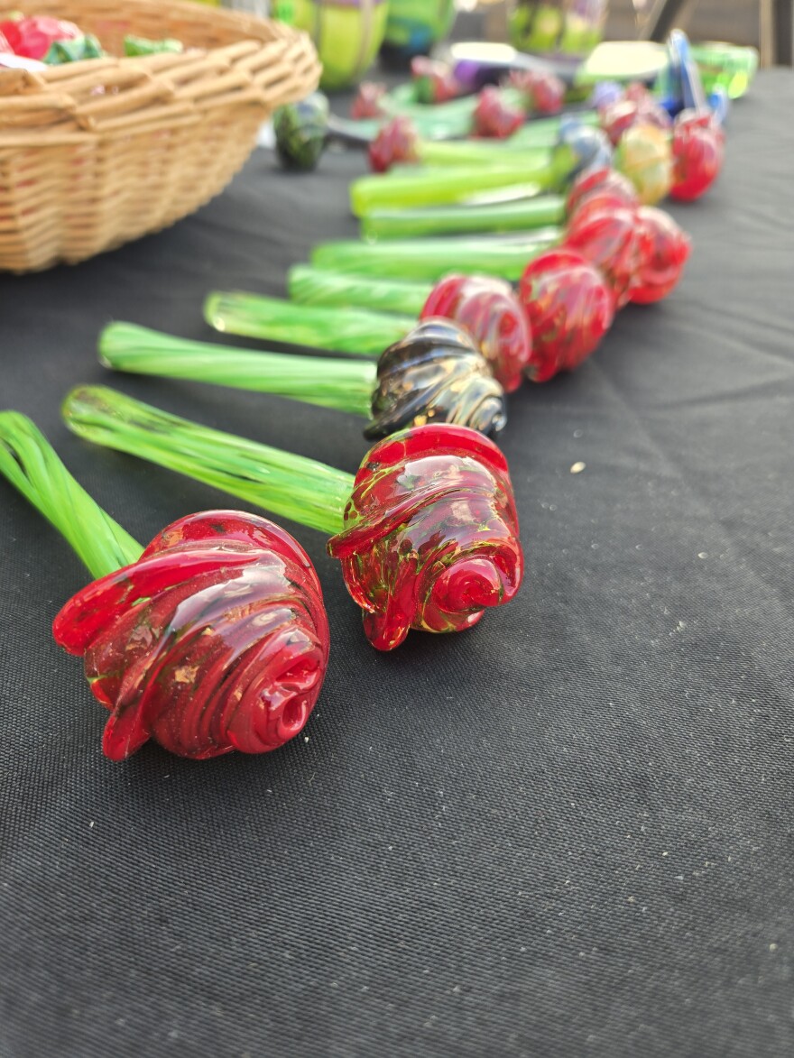 Glass roses made by Devan Cole for sale at the stock show and rodeo