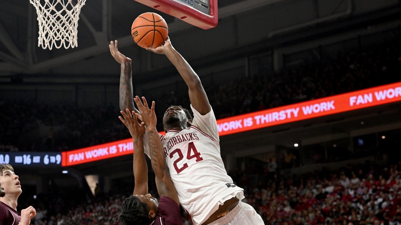 Richmond scores 23 points to lead No. 20 Arkansas past Texas A&M 99-84