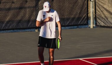Ludovico Vaccari tossing a ball up to serve. Texas Tech Men's Tennis vs UNM on February 15, 2026 (Photo by Adele Clarke/Texas Tech Athletics)