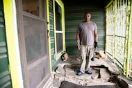 Loucious Miller stands on his dilapidated porch at his east Oak Cliff home on Wednesday,...