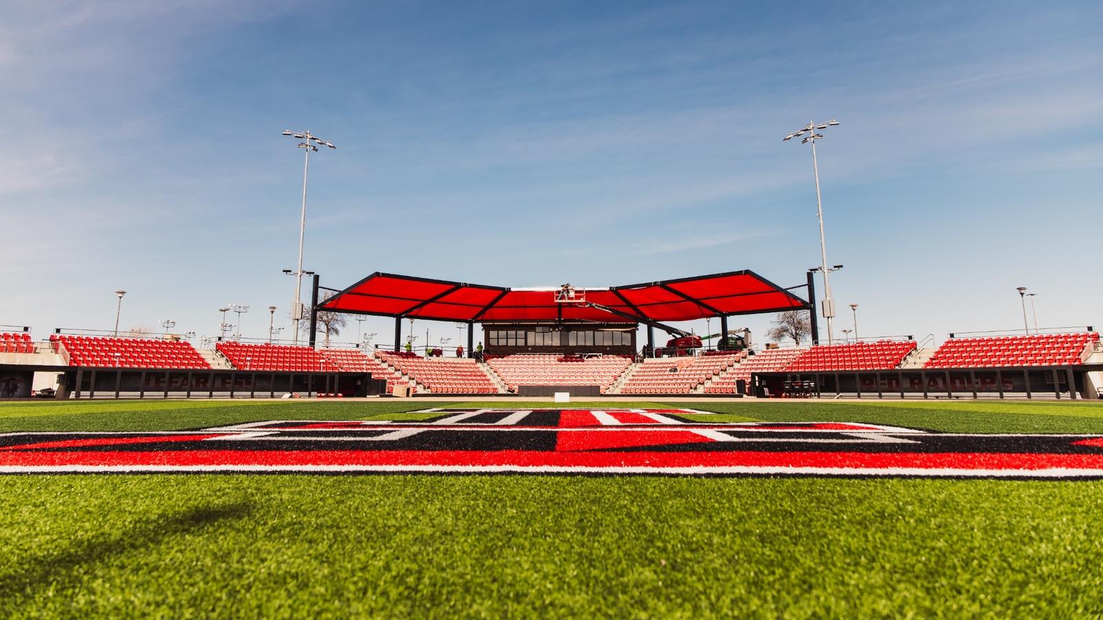 Hailey Toney rounding second after hitting a home run against ACU in softball