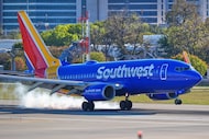 FILE - A Southwest Airlines plane lands at Love Field Airport, Nov. 26, 2025, in Dallas. (AP...