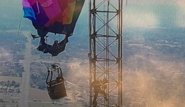 Two passengers rescued after hot air balloon crash into Texas cell tower leaves them dangling 920 feet up