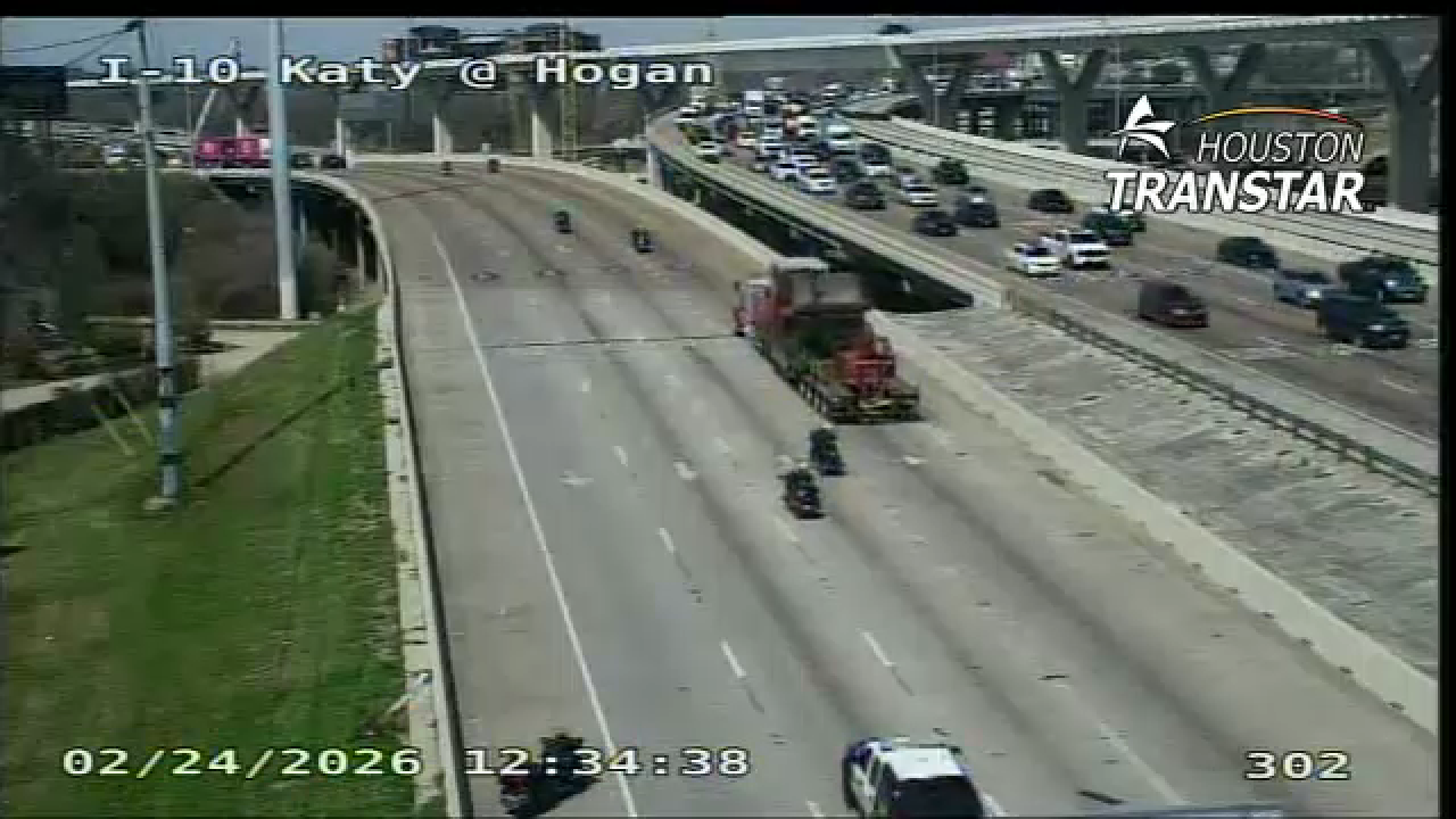 TranStar cameras show officers assisting the 18-wheeler in turning around.