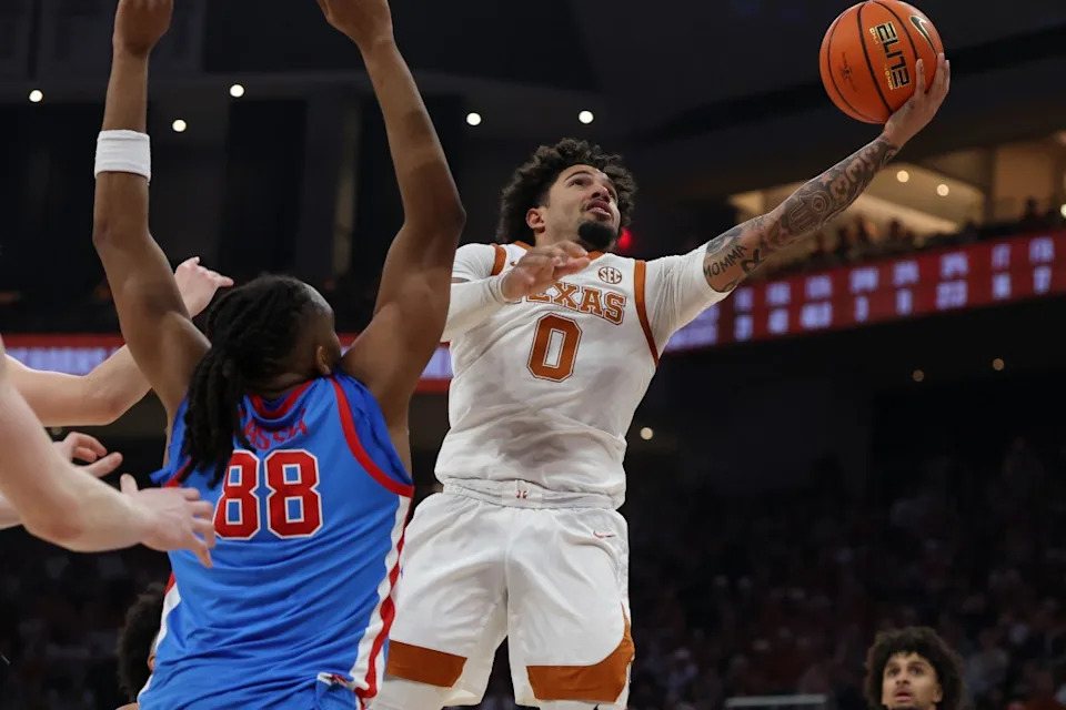 AUSTIN, TX – FEBRUARY 07: Guard Jordan Pope #0 of the Texas Longhorns drives past forward Augusto Cassia #88 of the Ole Miss Rebels for a shot during the SEC college basketball game between Texas Longhorns and Ole Miss Rebels on February 7, 2026, at Moody Center in Austin, TX. (Photo by David Buono/Icon Sportswire via Getty Images)