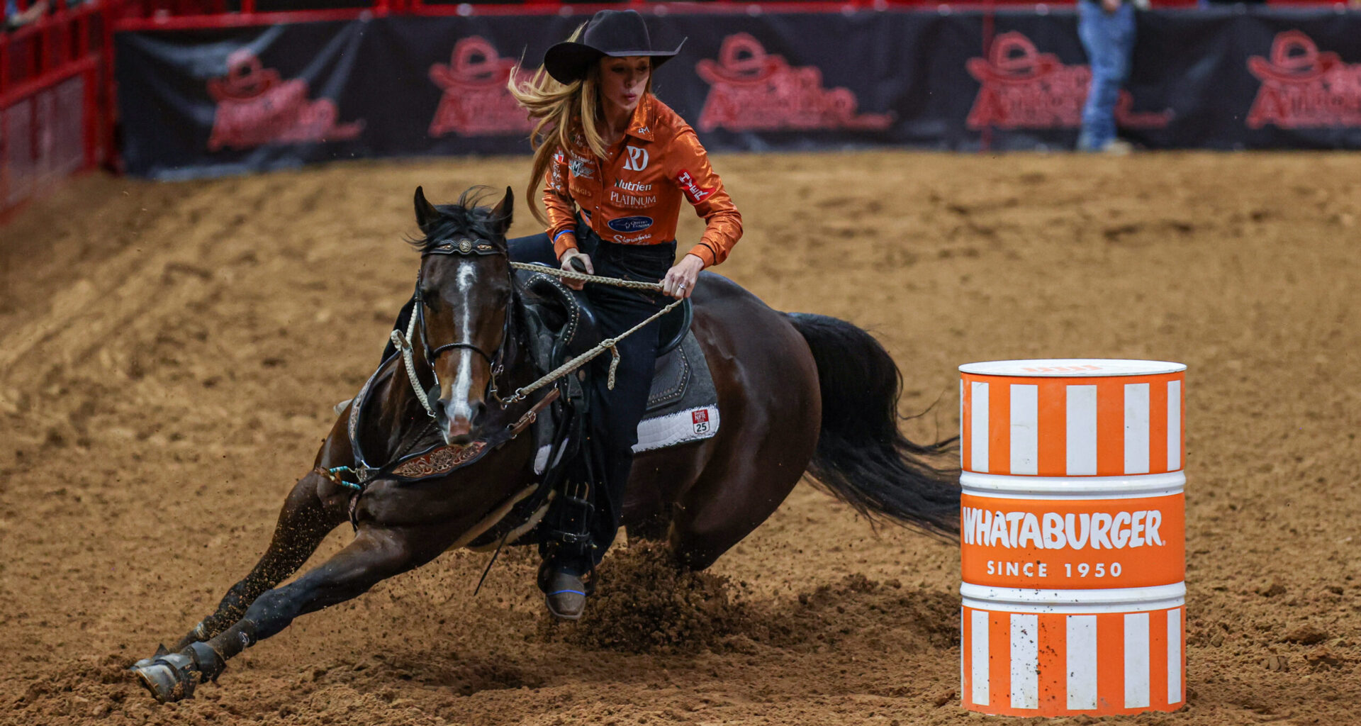 Emily Beisel turns a barrel on Liza in San Antonio