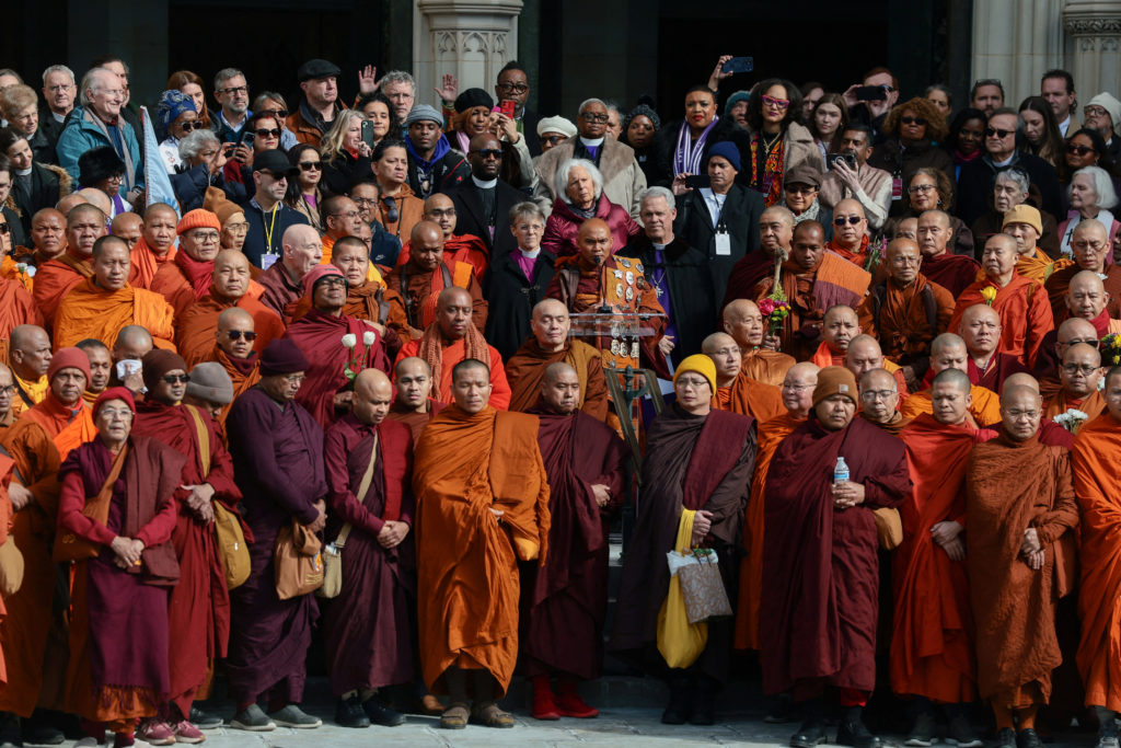 A group of Buddhist monks on the 2,300-mile "Walk for Peace" stand outside the National Cathedral in Washington