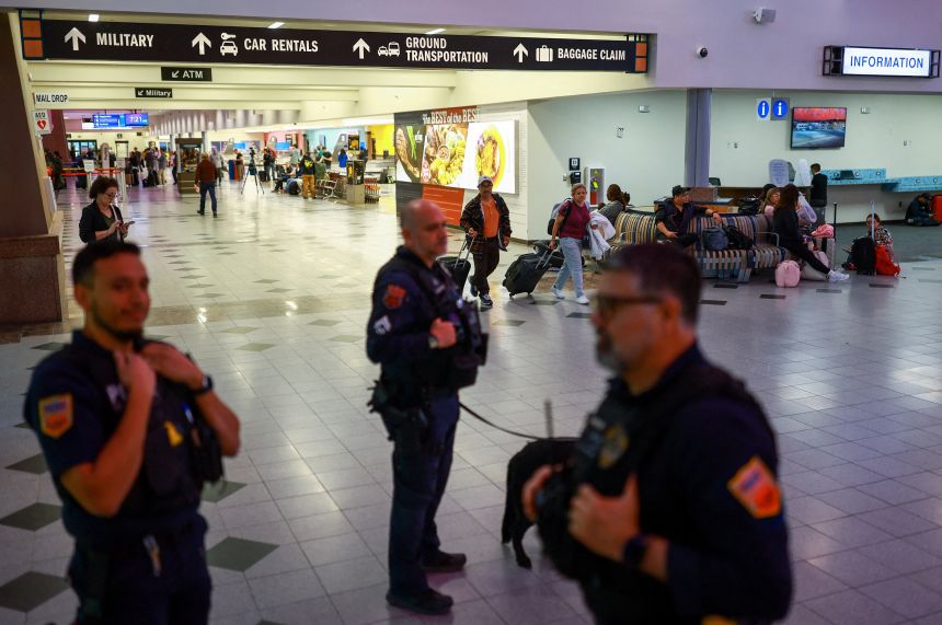 Security personnel at El Paso International Airport on  February 11, 2026.