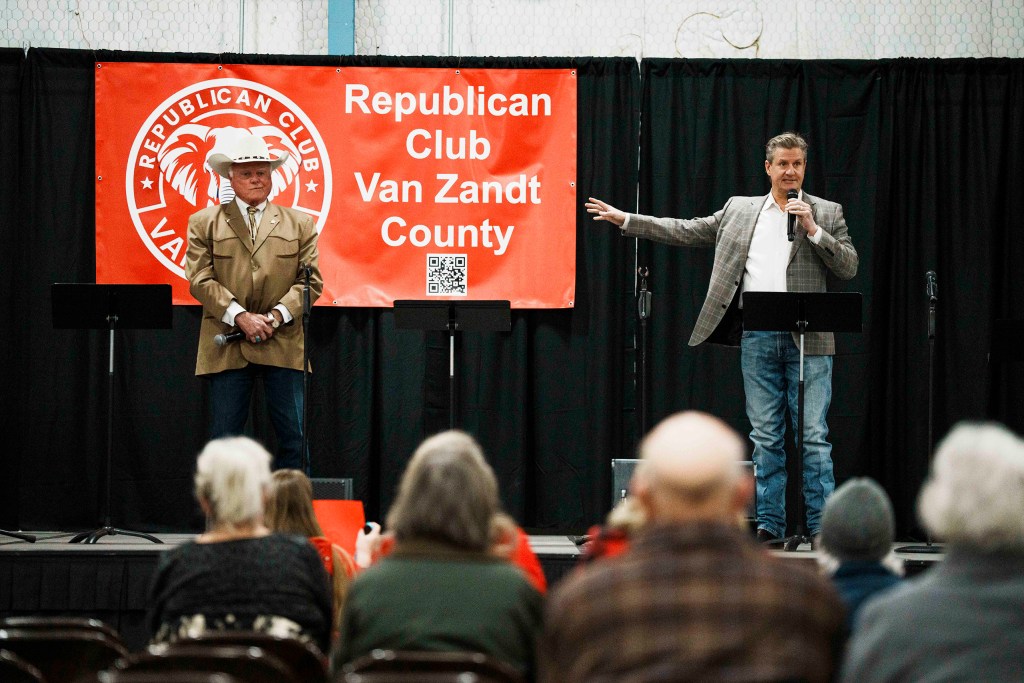 Candidate for Texas Agriculture Commissioner, Nate Sheets, instructs attendees to look up certain info about Sid Miller and his campaign team during a Texas Republican candidate debate forum at the Civic Center in Canton, Texas on Saturday, January 17, 2026.