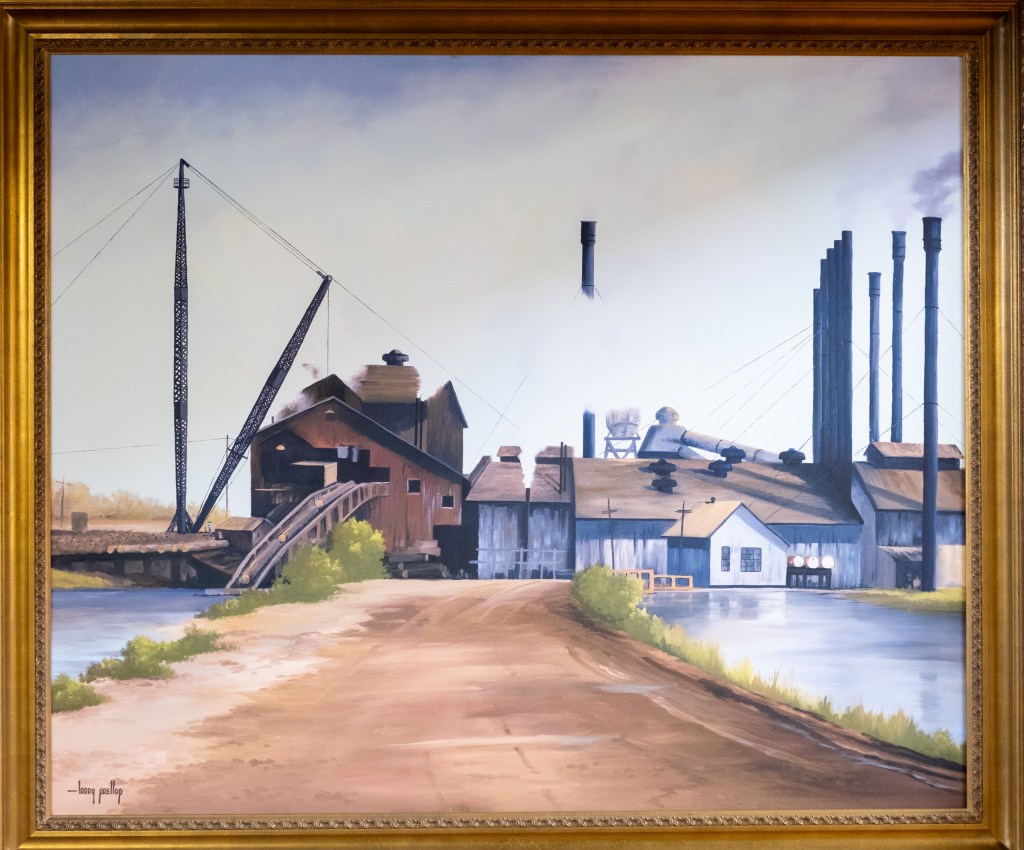A painting of the original Pineland location of Temple-Inland Inc. hangs in the Arthur Temple Sr. Memorial Library on Thursday January 29, 2026.