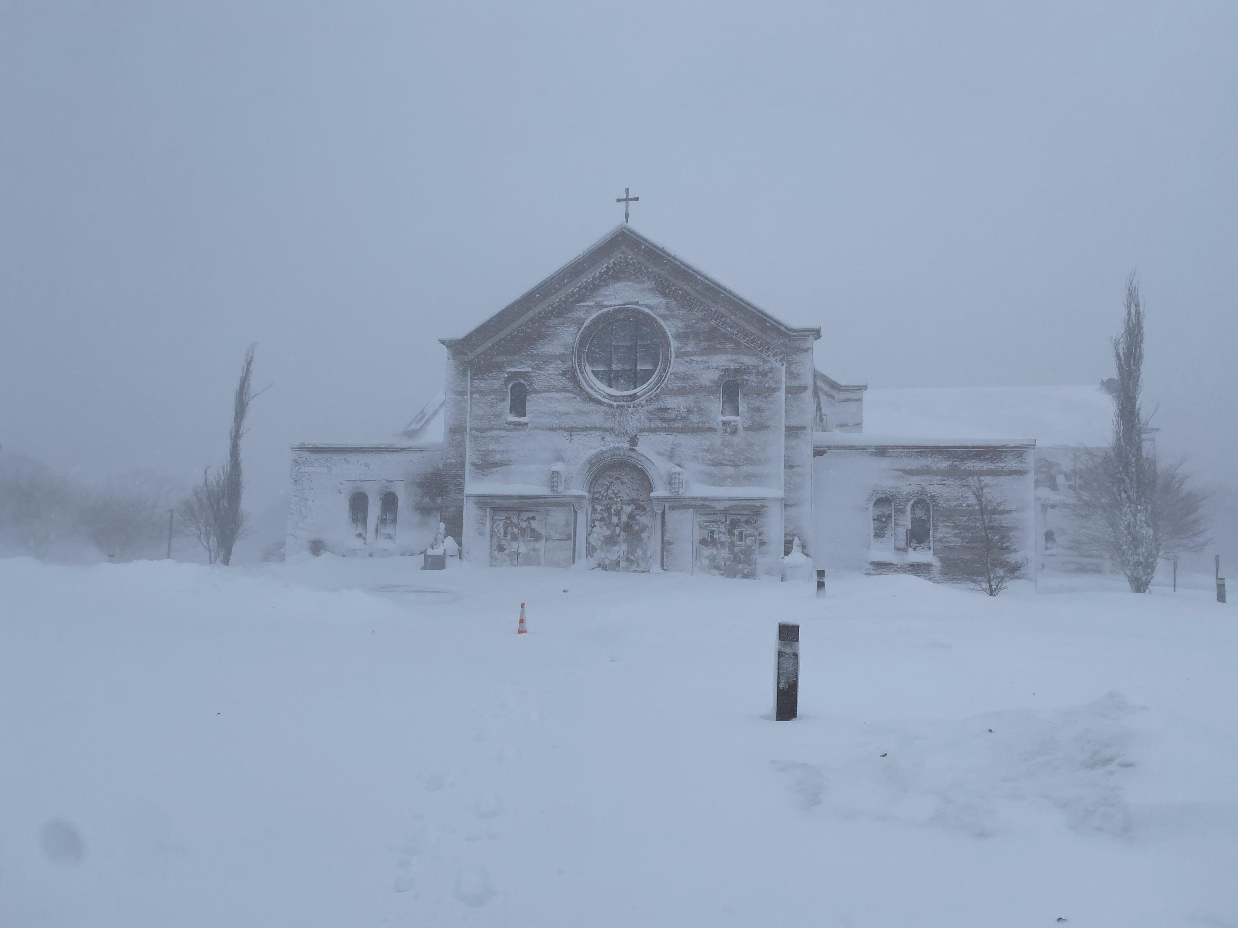 Snow-covered Corpus Christi Church in Sandwich