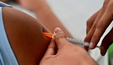A nurse from the Ecuadorean Ministry of Health vaccinates a person against whooping cough in Guayaquil, Ecuador on May 8, 2025.  (Photo by MARCOS PIN / AFP) (Photo by MARCOS PIN/AFP via Getty Images)