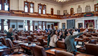 Lawmakers take a photo together ahead of a House session in Aug. 2025 at the Capitol in Austin.