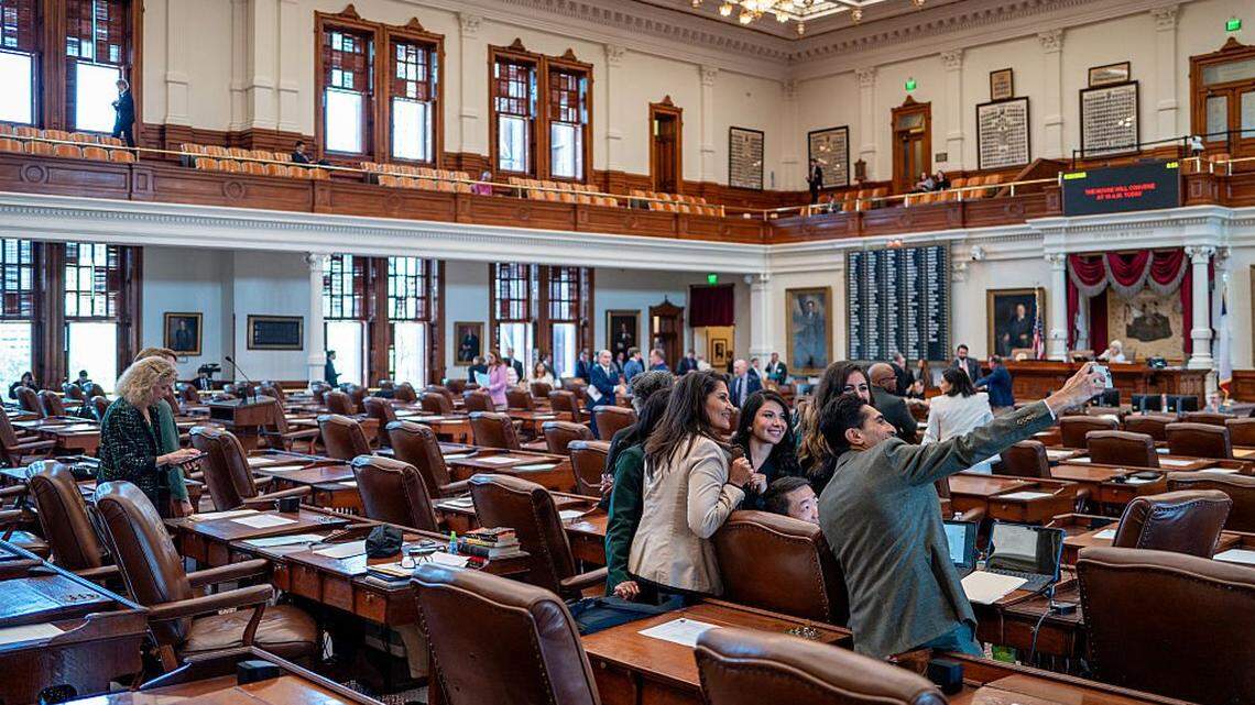 Lawmakers take a photo together ahead of a House session in Aug. 2025 at the Capitol in Austin.