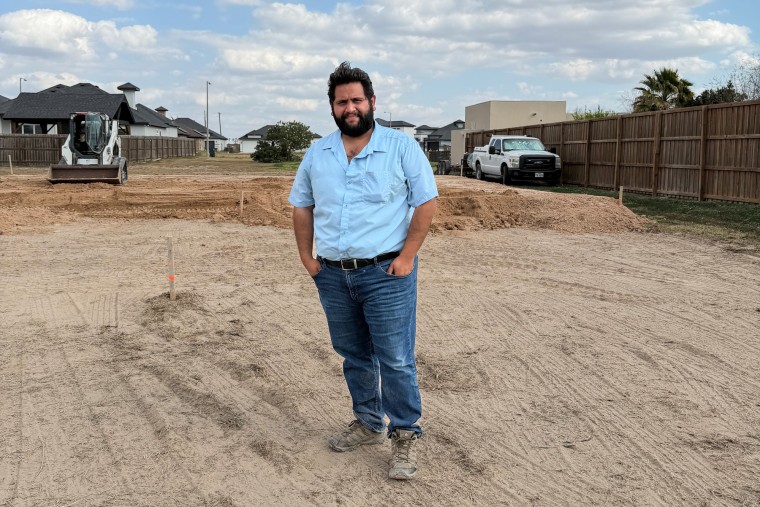 Xavier Vázquez stands outside