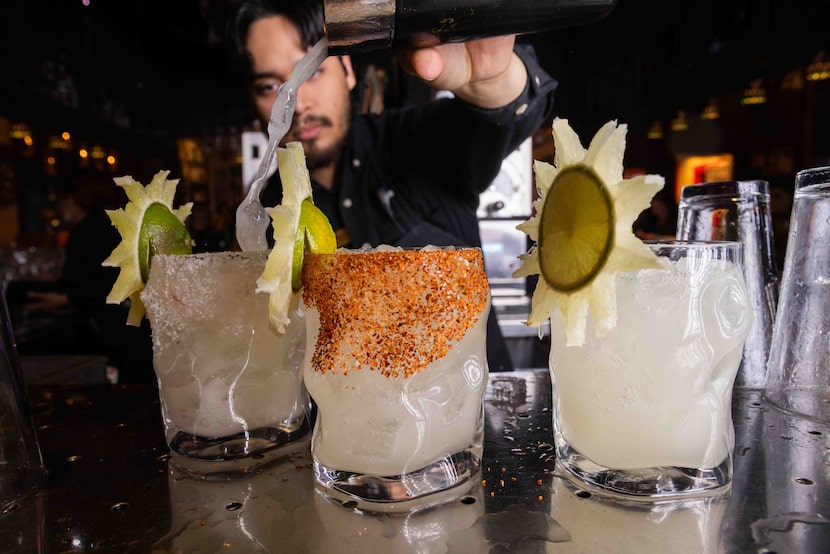 Bartender Christopher Martinez prepares The Mariano margarita on the rocks at Mariano's...
