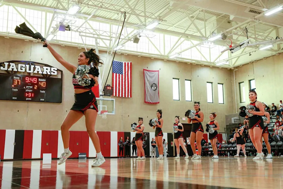 Texas A&M-San Antonio cheerleaders get the crowd riled up with free t-shirts during a break in the women's basketball game against the Southern University at New Orleans Knights inside the new A&M-San Antonio Recreation Center on Monday, Oct. 28, 2024, in San Antonio, Texas. (Sam Owens/San Antonio Express-News)