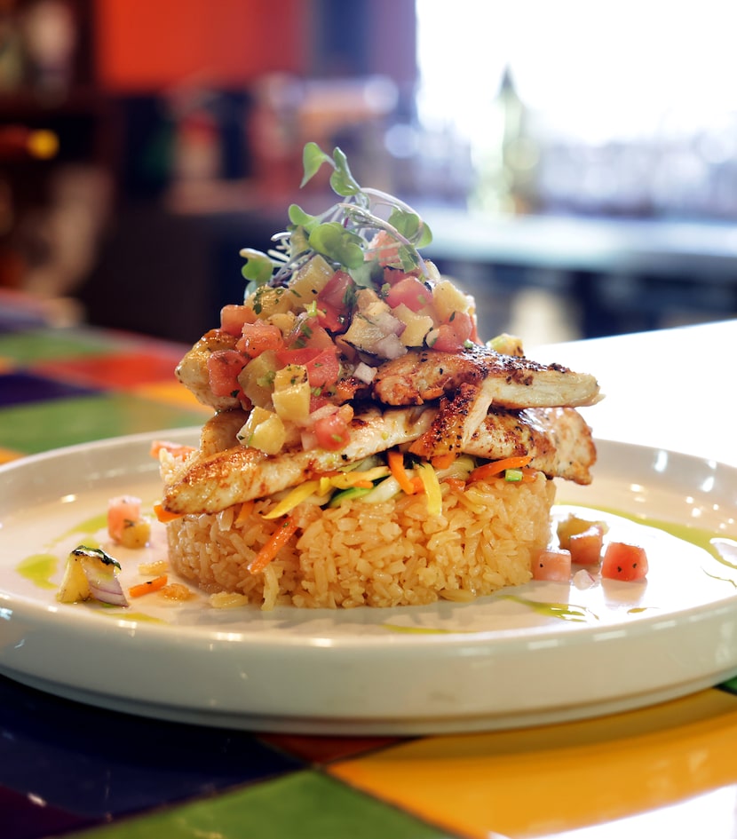 The Pollo Tropical plate Milagro Tacos Cantina in Dallas is a grilled chicken dish with pico...