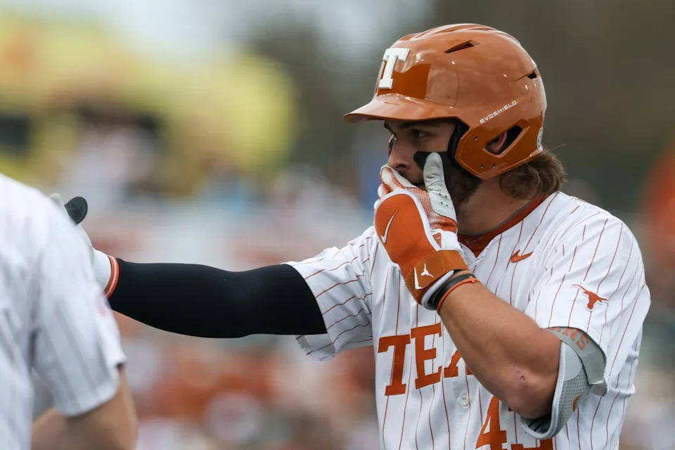AUSTIN, TX – FEBRUARY 21: Outfielder Aiden Robbins #43 of the Texas Longhorns covers his face and points to the dugout after getting an RBI single during the college baseball game between Texas Longhorns and Michigan State Spartans on February 21, 2026, at UFCU Disch-Falk Field in Austin, TX. (Photo by David Buono/Icon Sportswire via Getty Images)