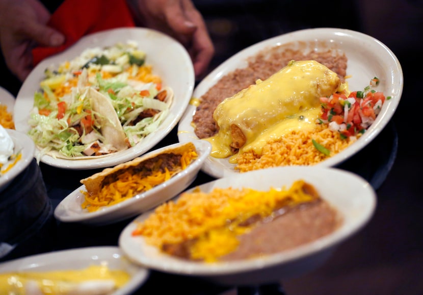 Entrees are served at El Fenix restaurant No. 1 along Woodall Rogers Freeway. El Fenix...