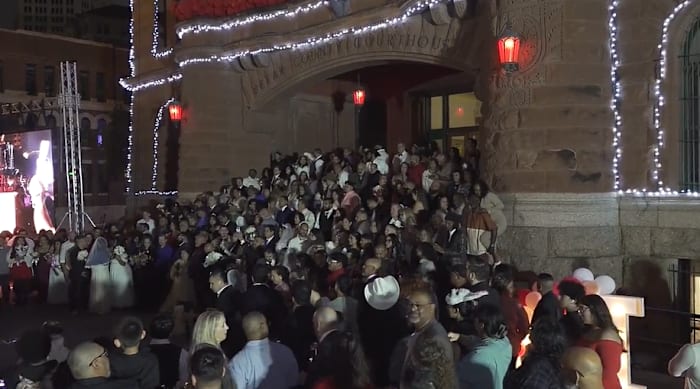 More than 100 couples kick off Valentine’s Day by getting married in downtown