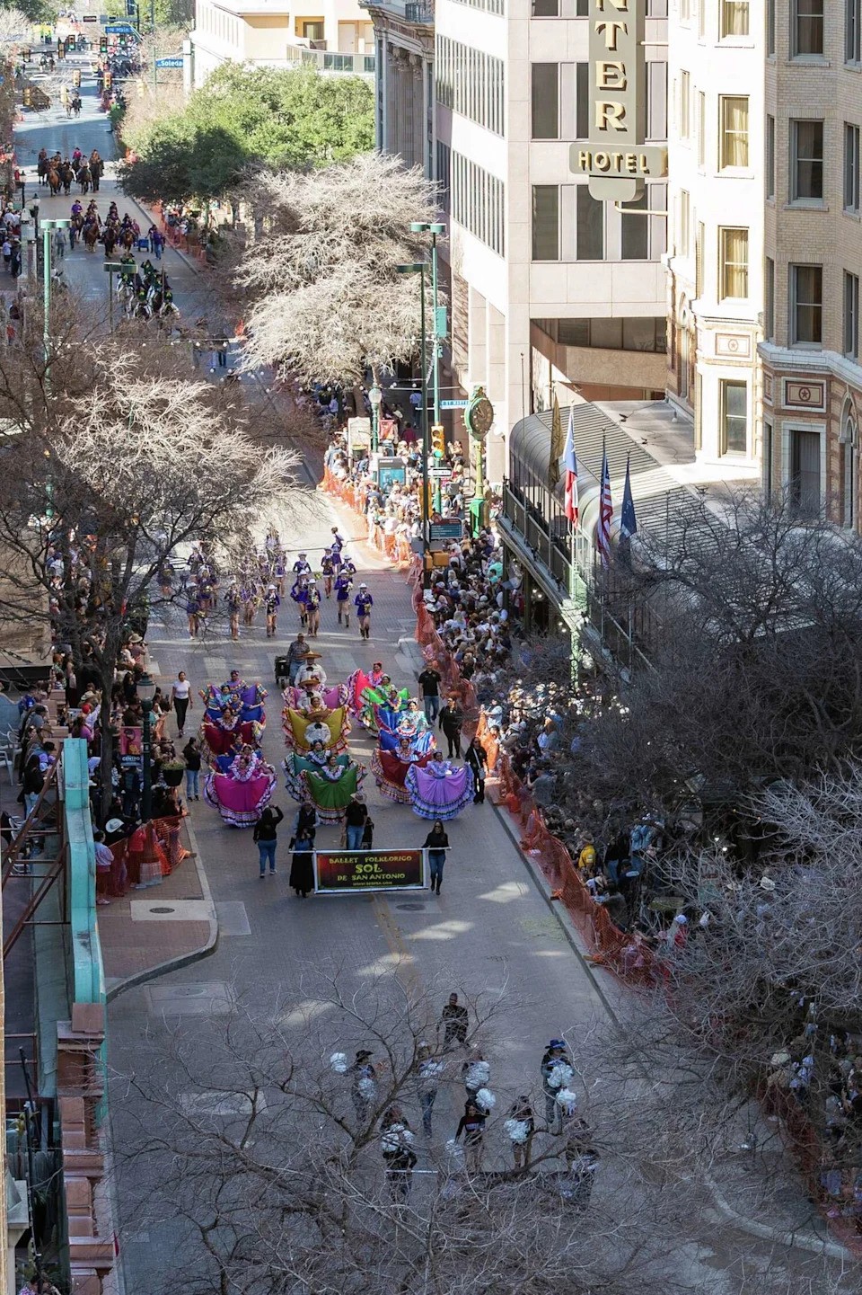 Crowds gather on the sidewalk as the Western Heritage Parade makes its way down Houston Street on Saturday, Feb. 7, 2026. (Blaine Young/Contributor)