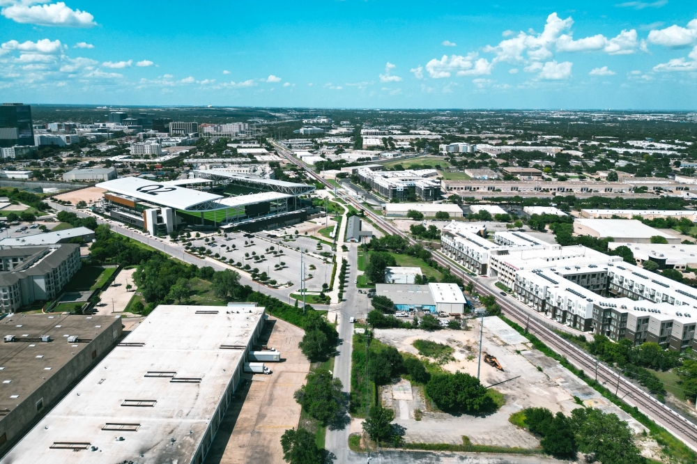Drone shot showing Q2 stadium and the rezoned site