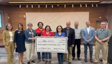 Image of Allen ISD and Foundation for Allen Schools officials posing with a big check for $150,233