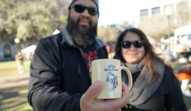 People holding a coffee mug