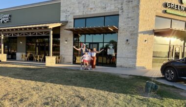 Owner Katie Walker poses with her family in front of the store. (Courtesy Drip Swag Shop)