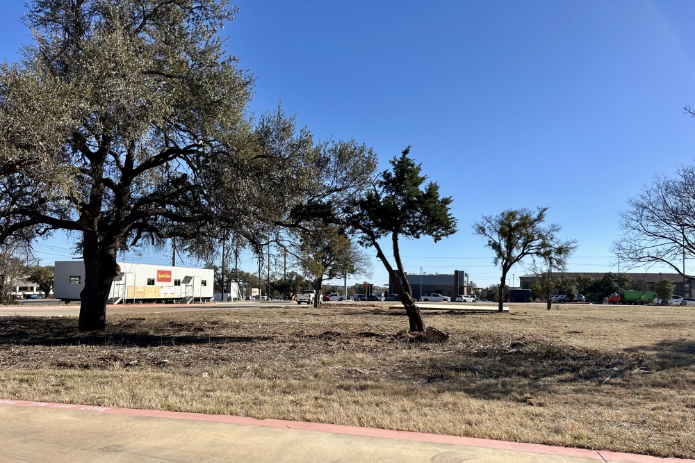 Frost Bank is being built near Academy Sports   Outdoors in Georgetown. (Gracie Warhurst/Community Impact)