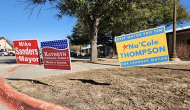 Campaign signs stood outside Leander City Hall ahead of the Feb. 7 special election. (Daniel Schwalm/Community Impact)