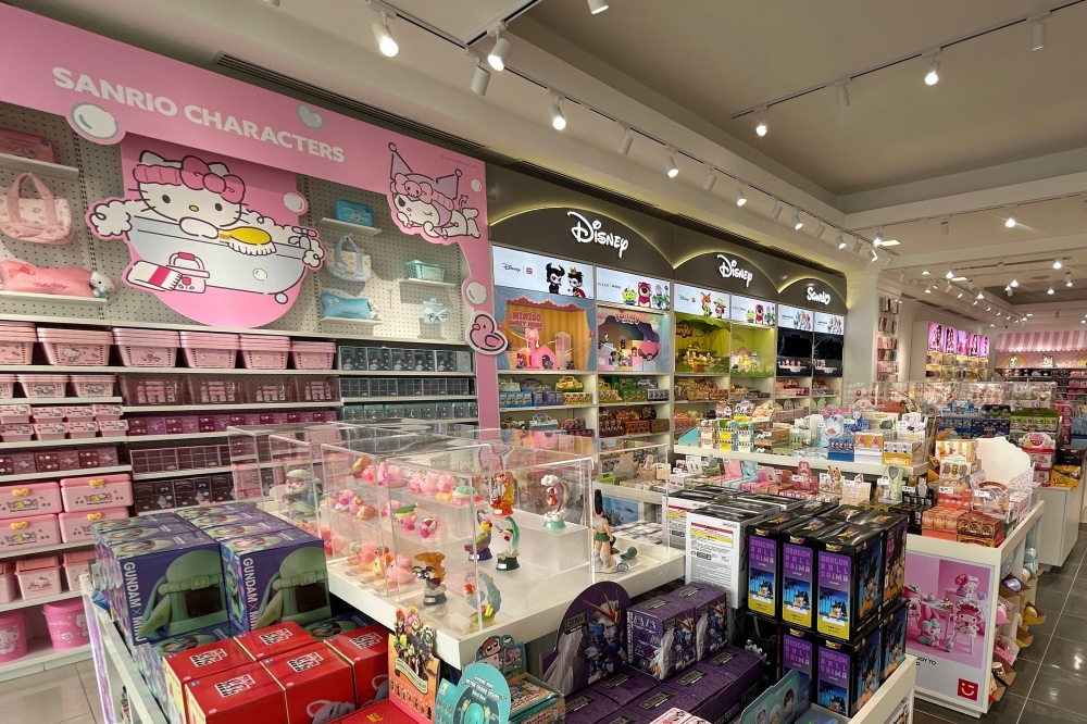 Interior of a retail space with collectible items displayed on shelves.