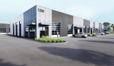 A rendering of the white and grey square buildings of Lone Star Business Park in Buda.